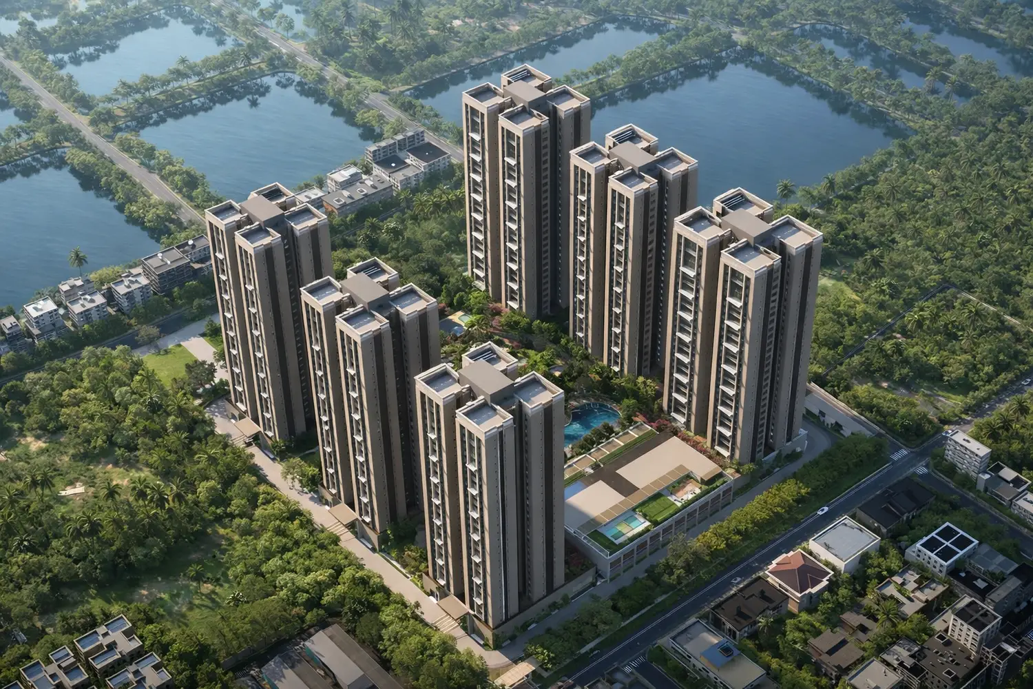 Aerial view of Utpalaa residential project showcasing multiple high-rise towers surrounded by lush greenery, water bodies, internal amenities, and well-planned roads.