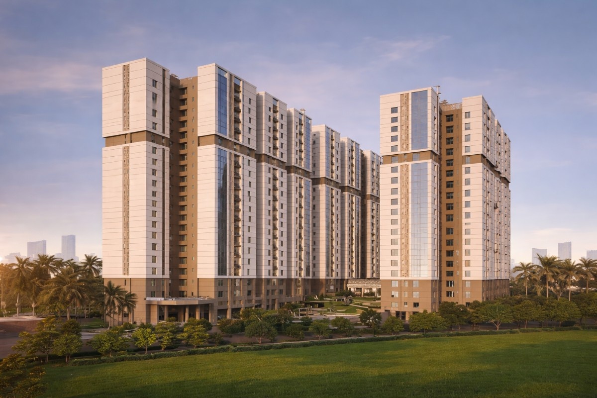 Front view of Bhawani Paraiso, a premium residential complex in New Town, Kolkata, featuring modern high-rise towers, landscaped green spaces, and contemporary architectural design.