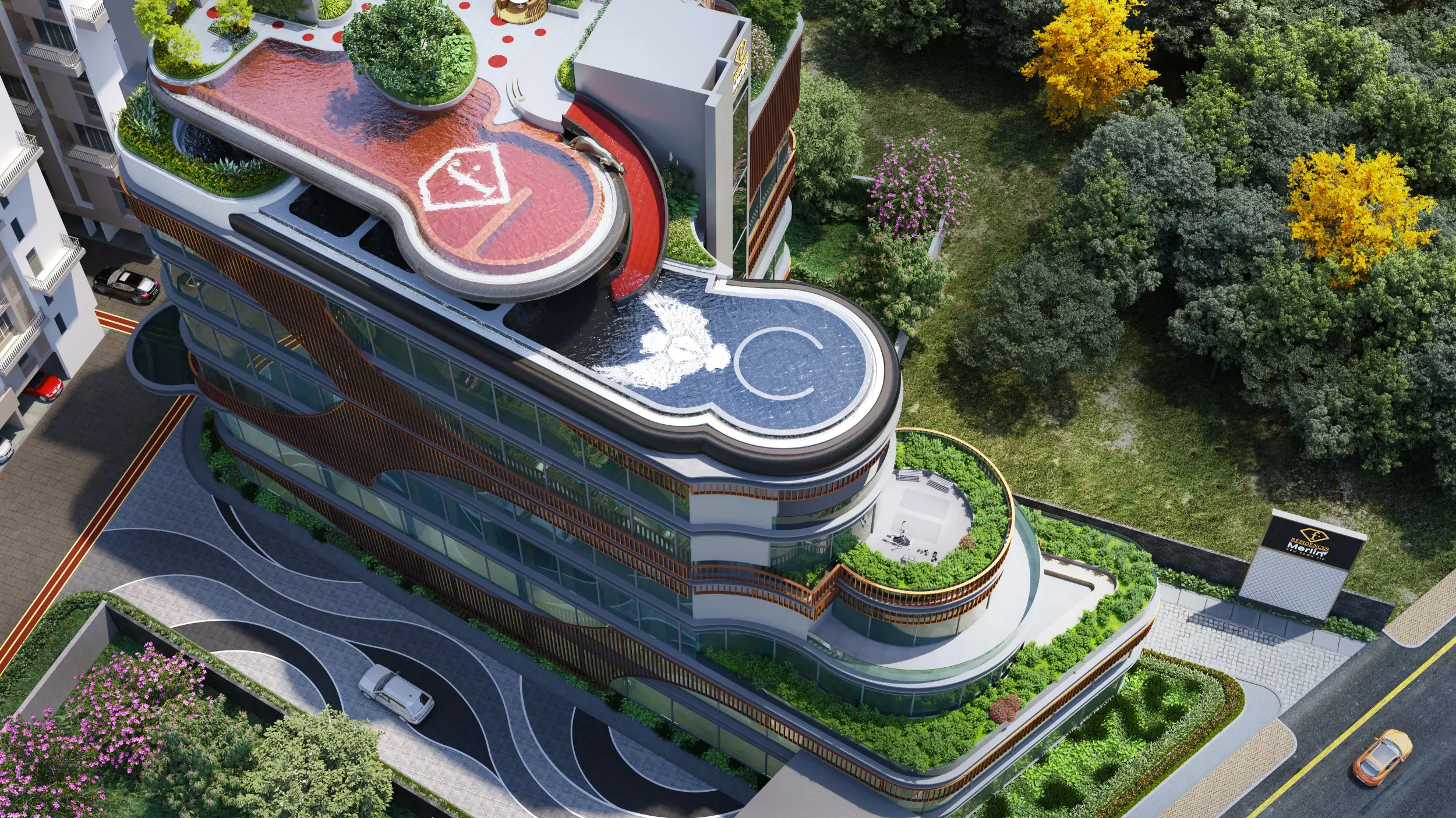 Aerial view of Merlin F Residences, showcasing a modern residential complex with multiple mid-rise towers arranged around landscaped courtyards, illuminated rooftop gardens, terraces with greenery, and a clubhouse featuring a swimming pool, all set within a well-planned urban environment.