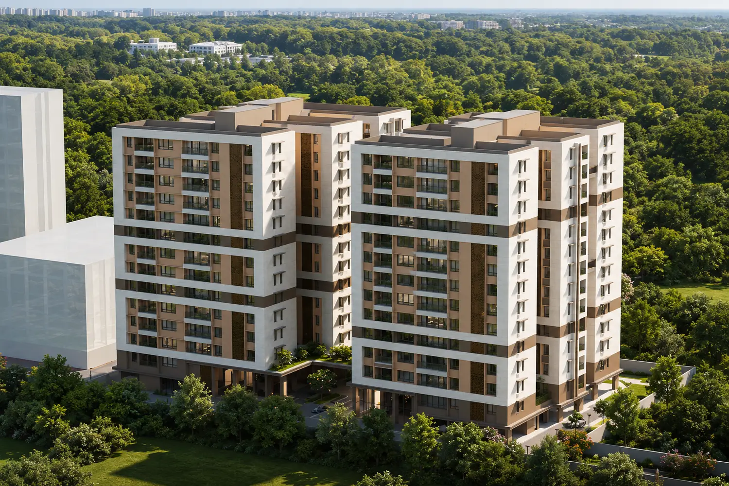 Aerial view of The Pravya residential towers surrounded by lush greenery and landscaped open spaces.