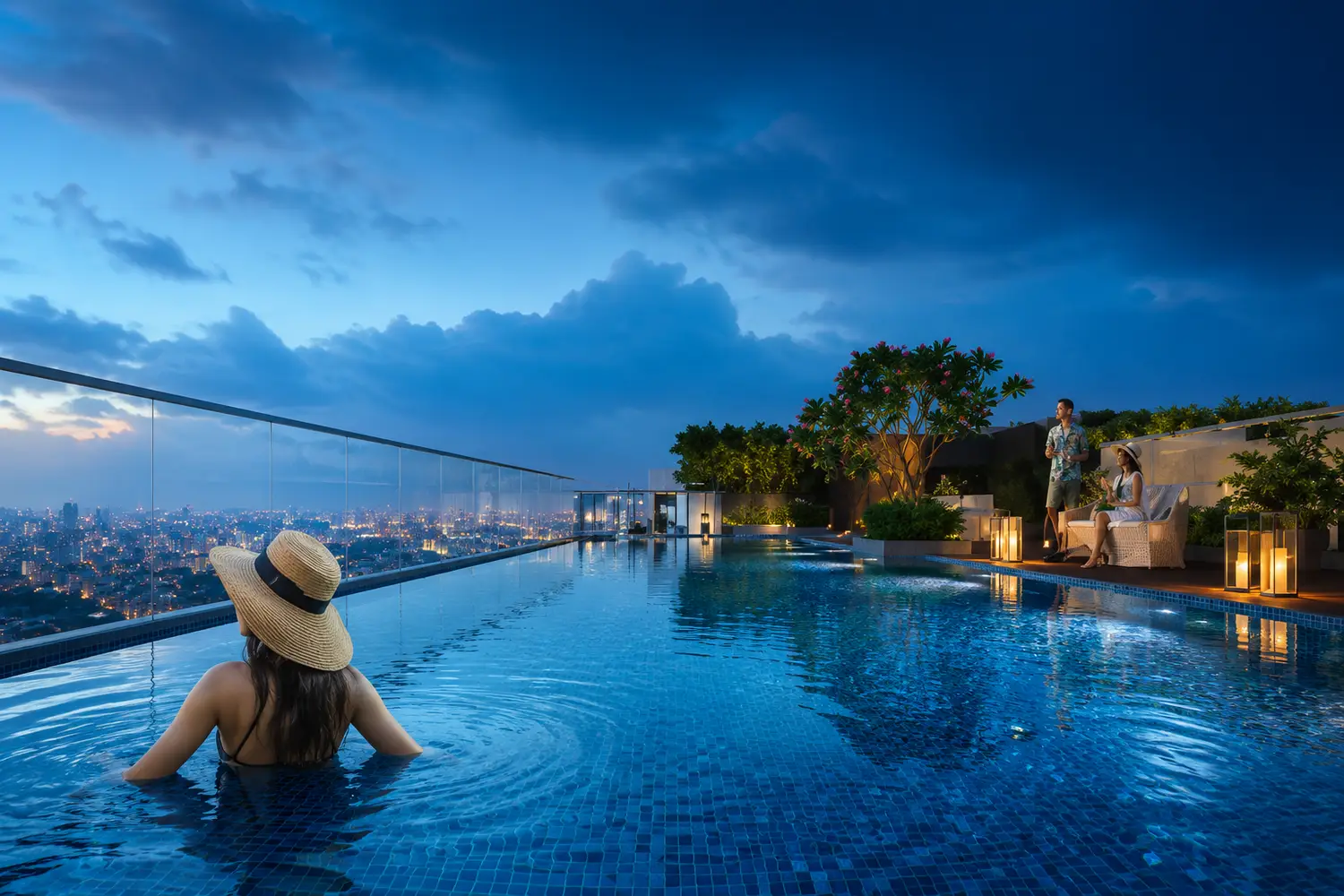 Rooftop infinity pool at Signum Niva in Alipore offering panoramic city views, elegant seating, landscaped surroundings and luxury lifestyle amenities.