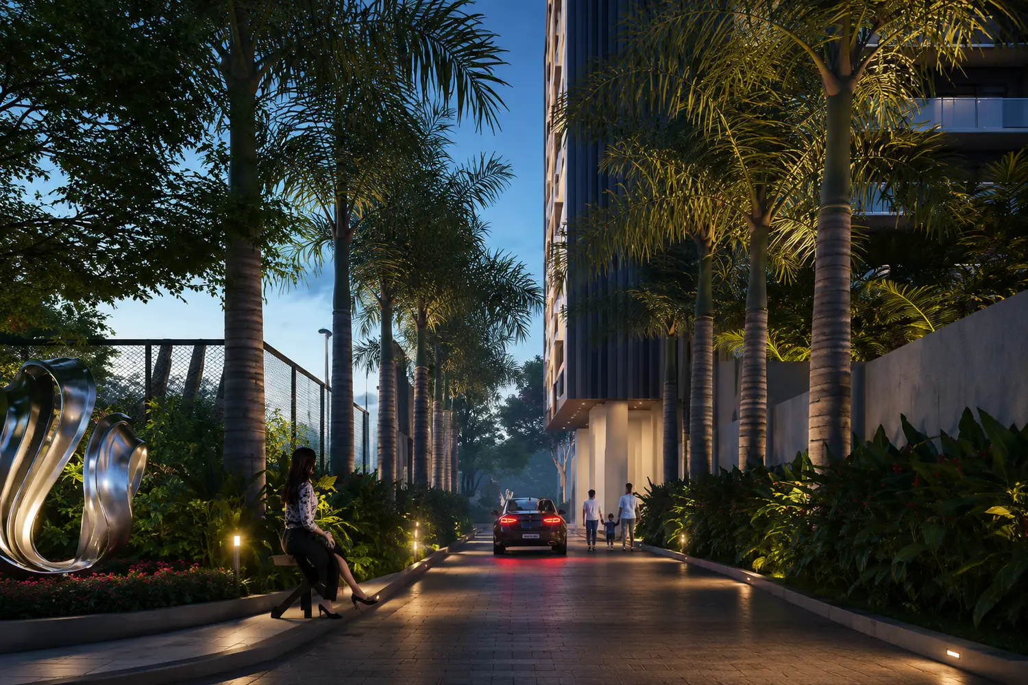 Landscaped entrance driveway at Signum Niva in Alipore featuring palm-lined pathways, lush greenery, elegant lighting and contemporary residential architecture.