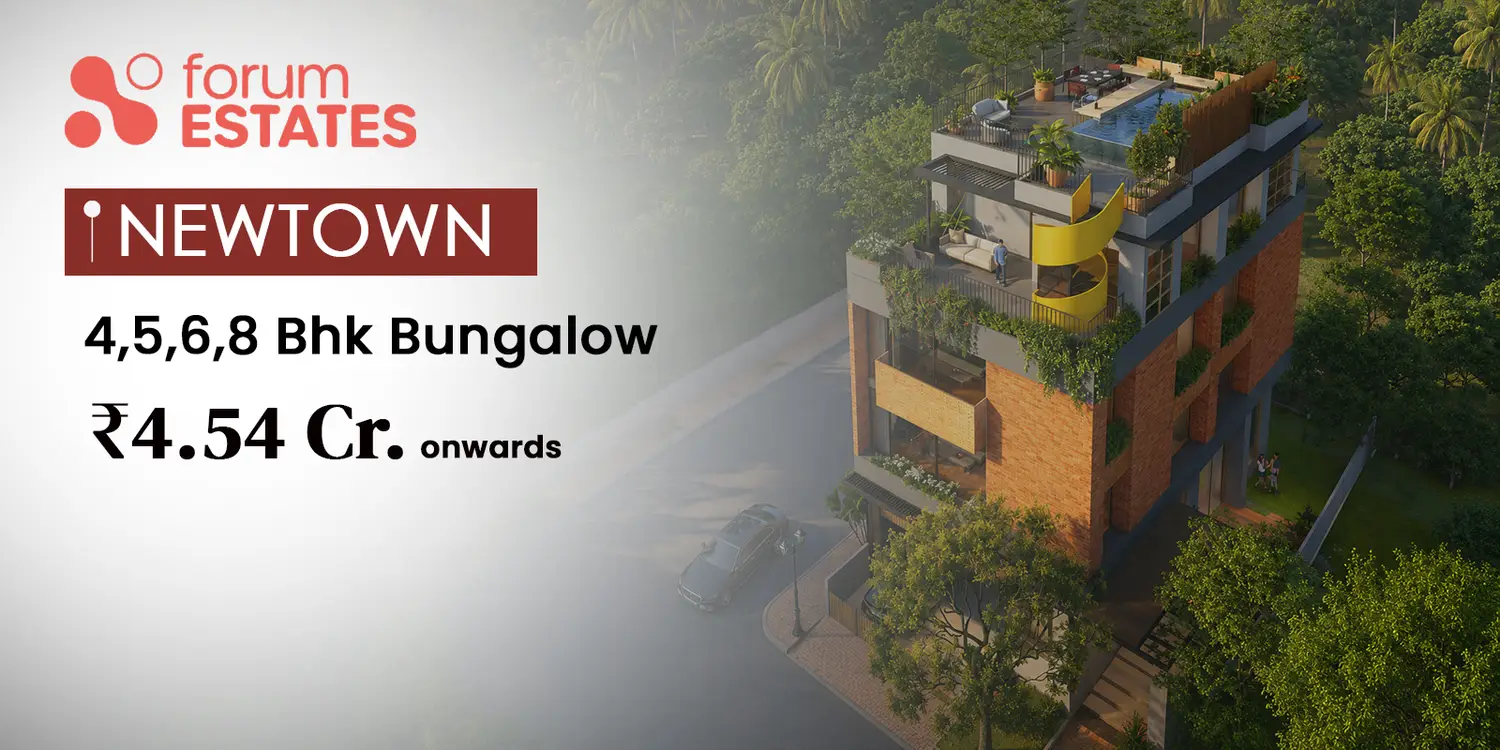 Aerial view of Forum Estates, an exclusive luxury residential development featuring a contemporary multi-storey building with warm brick and glass architecture, lush landscaped terraces, a rooftop infinity pool, private outdoor spaces, and a signature yellow spiral staircase, surrounded by dense tropical greenery and wide tree-lined roads.