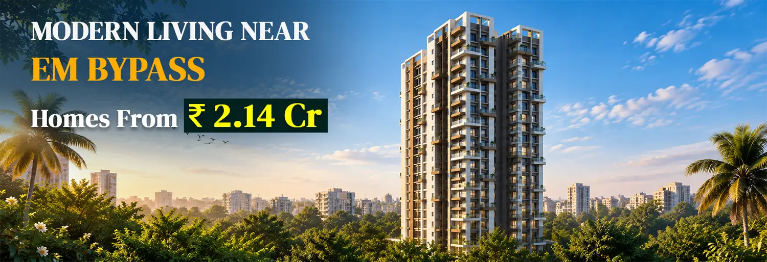 Anaaya luxury residential project near EM Bypass, Kolkata, featuring a modern high-rise tower surrounded by lush greenery, with homes starting from ₹2.14 Cr.