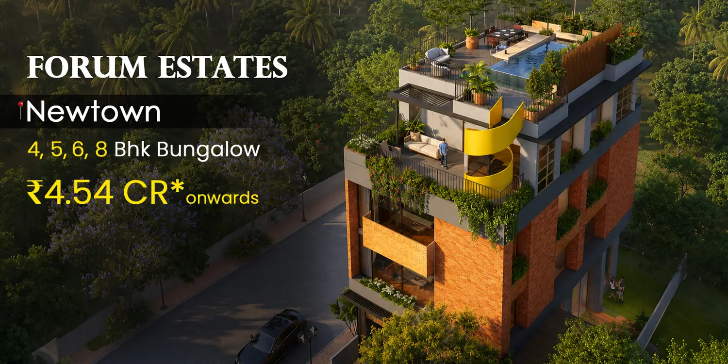 Aerial view of Forum Estates, an exclusive luxury residential development featuring a contemporary multi-storey building with warm brick and glass architecture, lush landscaped terraces, a rooftop infinity pool, private outdoor spaces, and a signature yellow spiral staircase, surrounded by dense tropical greenery and wide tree-lined roads.