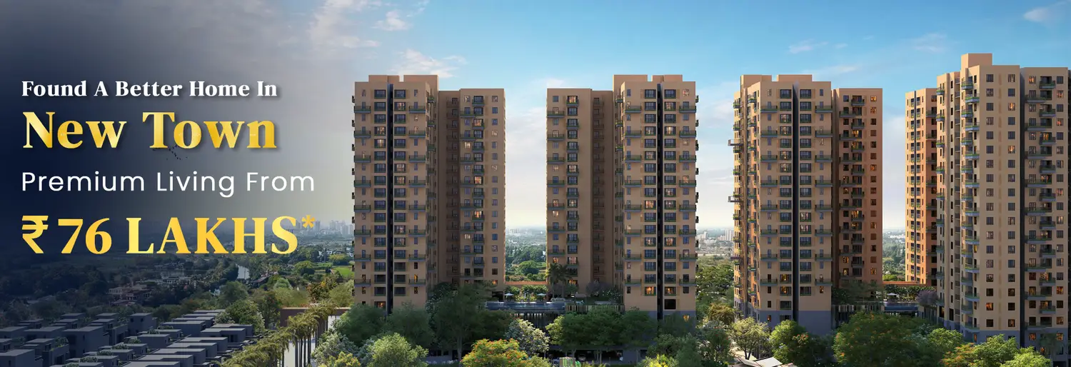 Bird’s-eye view of Vinayak 21 Acres, a contemporary residential enclave in New Town, Kolkata, featuring elegant high-rise towers, beautifully landscaped gardens, premium clubhouse amenities, a swimming pool, sports courts, and seamless road connectivity embraced by lush greenery.